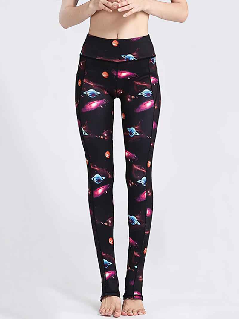 Women's galaxy print leggings with open heels for yoga and fitness.